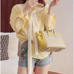 Sac à main fourre-tout décontracté pour femmes, sac à bandoulière seau en cuir de luxe, nouveau design de mode, grande capacité, sac incliné de shopping au bureau, 2025