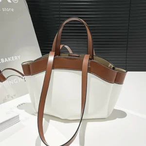 Nouveau panier en cuir sac à main marque de luxe concepteur grande capacité mode Simple contraste couleur banlieue Banquet sac fourre-tout à bandoulière