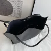 sac à main noir à la mode, grande capacité, léger et facile à transporter, le design rétro de sac à main à bandoulière unique est à la mode