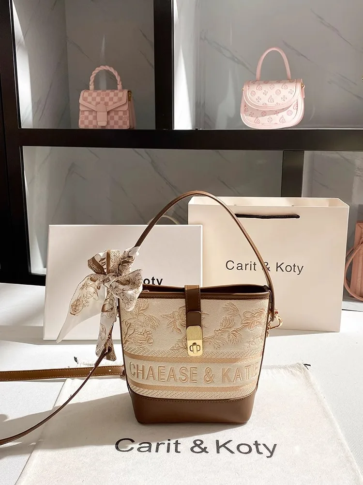 2025 sac seau et sac à bandoulière avec broderie florale et motif de logo et sac à main pour femme en matériau de haute qualité pour un usage quotidien