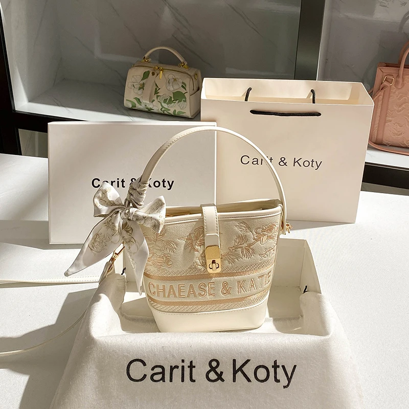 2025 sac seau et sac à bandoulière avec broderie florale et motif de logo et sac à main pour femme en matériau de haute qualité pour un usage quotidien