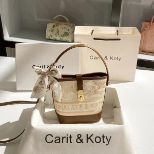 2025 Sac seau et sac à bandoulière avec broderie florale et motif de logo et sac à main pour femme en matériau de haute qualité pour un usage quotidien 2025 Sac seau et sac à bandoulière avec broderie florale et motif de logo et sac à main pour femme en matériau de haute qualité pour un usage quotidien