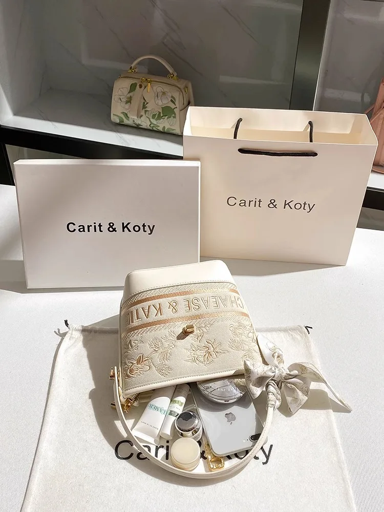 2025 sac seau et sac à bandoulière avec broderie florale et motif de logo et sac à main pour femme en matériau de haute qualité pour un usage quotidien