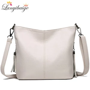 Sac à main en cuir avec pompon pour femme, sacs à bandoulière, sac à main de créateur de luxe, sacs initiés, sacs à main et sacs à main, fourre-tout, nouveau, 2024 Sac à main en cuir avec pompon pour femme, sacs à bandoulière, sac à main de créateur de luxe, sacs initiés, sacs à main et sacs à main, fourre-tout, nouveau, 2024