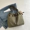 sac à bandoulière avec cordon de serrage pour femmes, fourre tout de voyage imperméable en nylon, style basique décontracté, sac seau, nouvelle mode