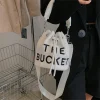 sacs seau en peluche pour femmes, sac à main de luxe de styliste, mode lettre imprimée, haute qualité, mignon, sac à bandoulière, nouvelle collection 2025