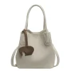 Le petit sac élégant est un sac à bandoulière polyvalent pour les femmes et un sac seau à main super populaire Le petit sac élégant est un sac à bandoulière polyvalent pour les femmes et un sac seau à main super populaire