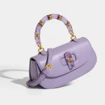 Super beau sac à main en bambou rétro marque sac de selle nouveau sac pour femmes haut de gamme exquis luxe rose serrure en cuir sac à bandoulière