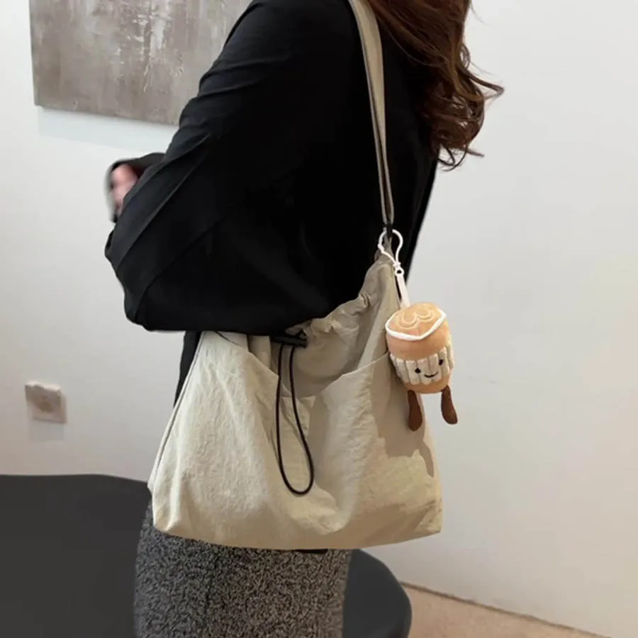 sac à bandoulière avec cordon de serrage pour femmes, fourre tout de voyage imperméable en nylon, style basique décontracté, sac seau, nouvelle mode