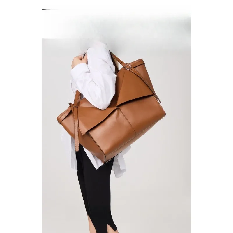 sac fourre tout de grande capacité de petit design 2025, sac seau d'eau simple européen et américain, sac à bandoulière à une épaule pour femmes