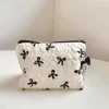 trousse cosmétique à nœud plissé pour femmes, trousse de maquillage en coton pour filles, poudres de maquillage portables little bow, trousse de maquillage de voyage matelassurera