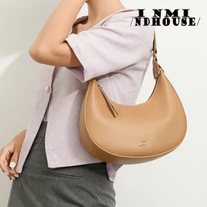 Sac baguette cartable de style européen et américain, sac sous les ati elles, sac de moto à bandoulière populaire, design littéraire, tendance, nouveau, été 2024 Sac baguette cartable de style européen et américain, sac sous les ati elles, sac de moto à bandoulière populaire, design littéraire, tendance, nouveau, été 2024