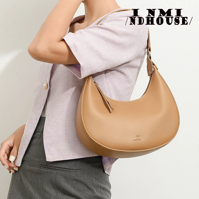 Sac baguette cartable de style européen et américain, sac sous les ati elles, sac de moto à bandoulière populaire, design littéraire, tendance, nouveau, été 2024 Sac baguette cartable de style européen et américain, sac sous les ati elles, sac de moto à bandoulière populaire, design littéraire, tendance, nouveau, été 2024