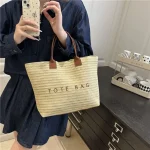 Sac à main de plage mignon tissé en paille, sac seau de grande capacité, sac de plage bohème, sac à bandoulière avec lettres de voyage