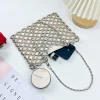 sac femmes 2025 nouveau décontracté à la main argent perlé creux sac tissé sac à main simple épaule sous les bras mère sac