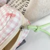 mini trousse de maquillage en coton matelassé pour femme, sac de rangement pour serviette hygiénique, porte monnaie étudiant, clés, sauna, poudres de téléphone, nœud à carreaux