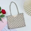 Sac femmes 2025 nouveau décontracté à la main argent perlé creux sac tissé sac à main simple épaule sous les bras mère sac