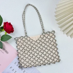Sac femmes 2025 nouveau décontracté à la main argent perlé creux sac tissé sac à main simple épaule sous les bras mère sac