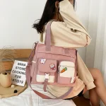 Nouveau sac à main d&rsquo;école de créateur sac de messager pour les jeunes adolescentes sac à bandoulière fourre-tout grande capacité en Nylon femmes sac à bandoulière cartables