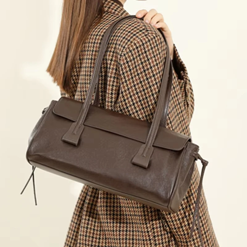 2025 nouveau sac à bandoulière en cuir véritable pour femmes grande capacité peau de vache sac à main de luxe longue bande vin rouge Baguette sac femme 2025 nouveau sac à bandoulière en cuir véritable pour femmes grande capacité peau de vache sac à main de luxe longue bande vin rouge Baguette sac femme