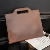 sac à main en cuir célèbre pour hommes, sac à bandoulière pour jeunes, étui à bombes d'affaires, sac à fichiers, grande capacité, nouveau, 2025