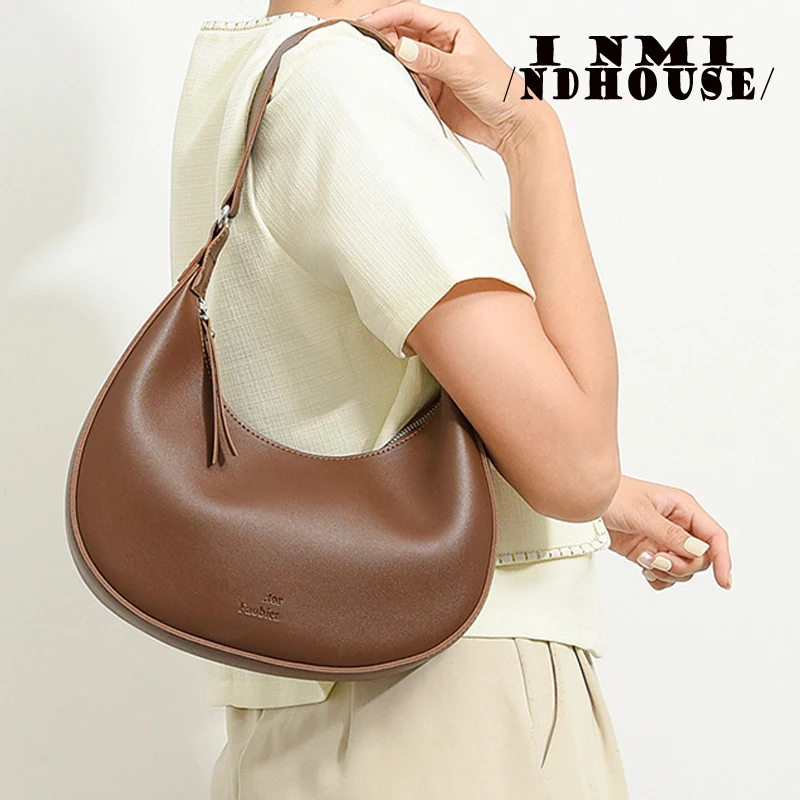 sac baguette cartable de style européen et américain, sac sous les ati elles, sac de moto à bandoulière populaire, design littéraire, tendance, nouveau, été 2024