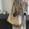 sac à bandoulière élégant en daim pour femmes, sac hobo en forme de croissant à sangle réglable pour le travail, les voyages et l'usage quotidien