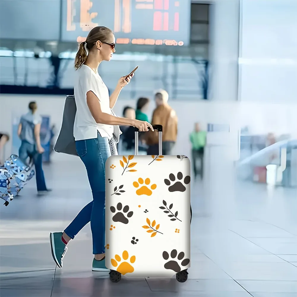 1 housse de bagage à motif de patte d'animal et de feuille. Convient aux valises de 18 à 32 pouces ; protège efficacement vos bagages