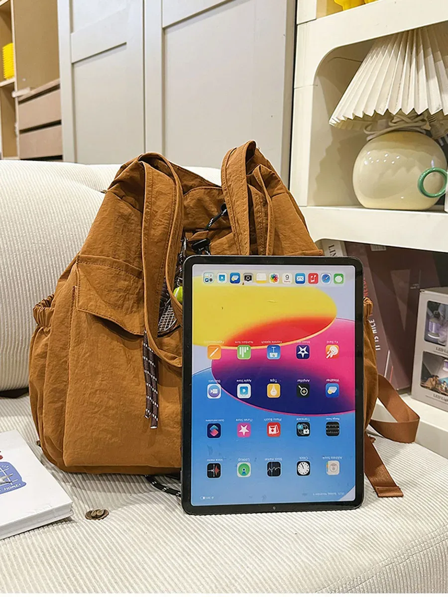 sac à dos de voyage 2-en-1 pour femmes, léger, de style coréen, décontracté, sac à bandoulière multifonctionnel avec cordon de serrage pour étudiantes.