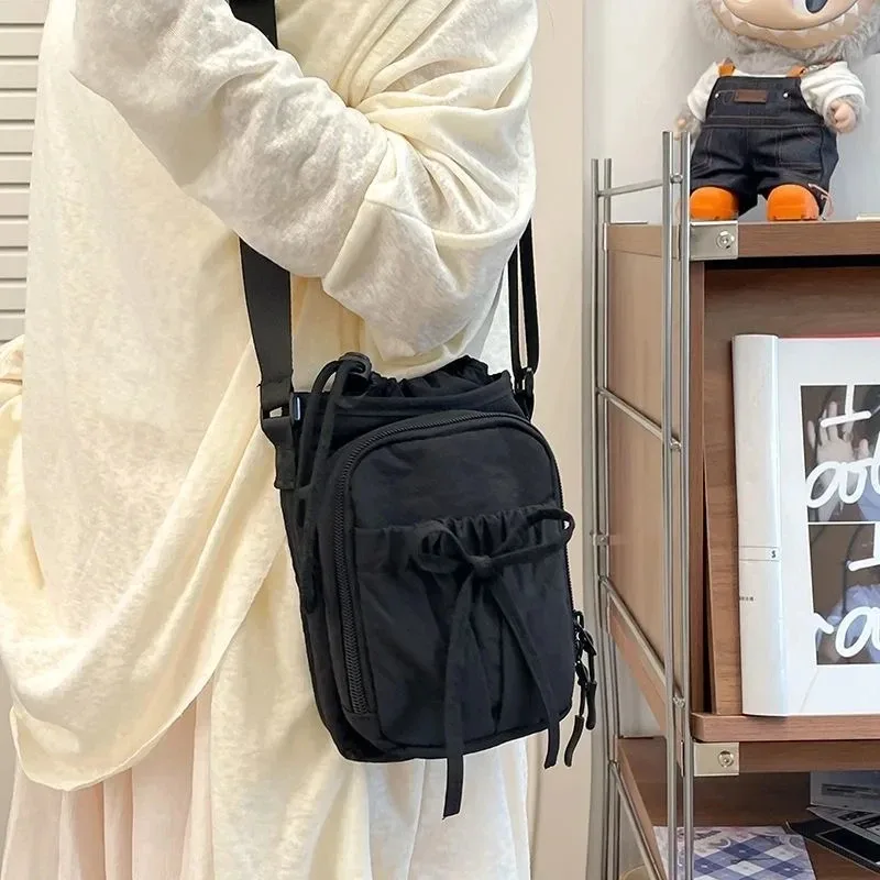 nouveau sac bandoulière léger pour téléphone portable pour femme, sac de sport extérieur, sac de cyclisme, porte-bouteille d'eau, sac de voyage, design à nœuds