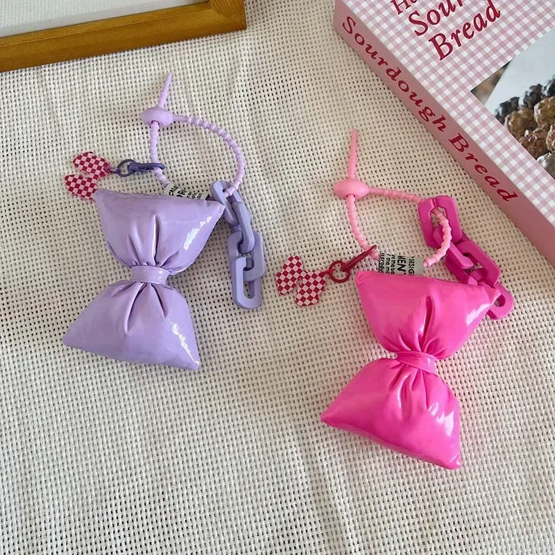 porte-clés en cuir et coton avec nœud doux pour fille, pendentif simple et mignon pour sac à dos, décoration de sacs
