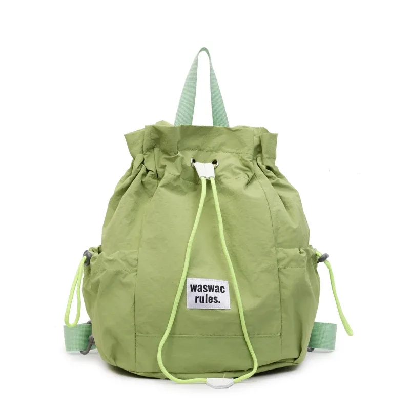 sac en toile polyvalent de grande capacité, décontracté, nouvelle mode d'été 2025, sac à dos à cordon de serrage, concis, couleur unie, sacs d'école légers