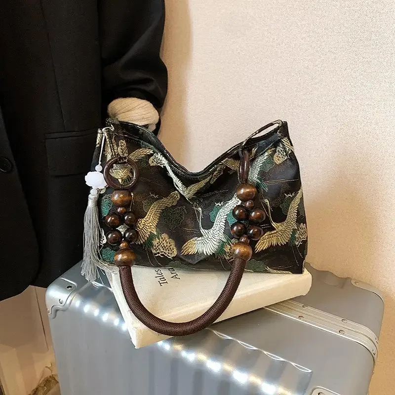 hasp fil à coudre brodé style national sacs à bandoulière gland décoration 2025 printemps nouvelle offre spéciale sacs à main pour femmes