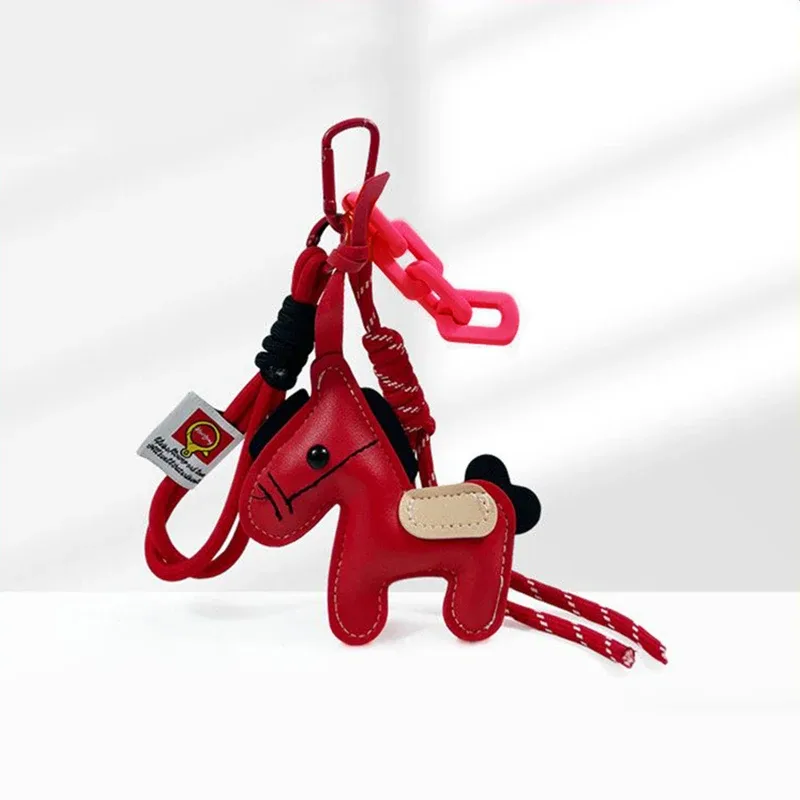 porte-clés en corde tressée avec pendentif en cuir motif cheval, accessoire de mode pour sacs à main, sacs à dos et décoration de clés de voiture