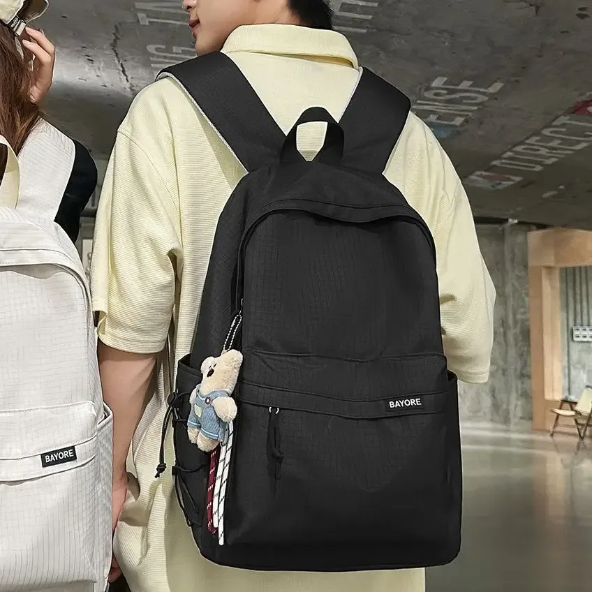sac à dos de voyage décontracté grande capacité pour homme, motif quadrillé simple, sac d'école en nylon, style campus jeune, système anti-gravité