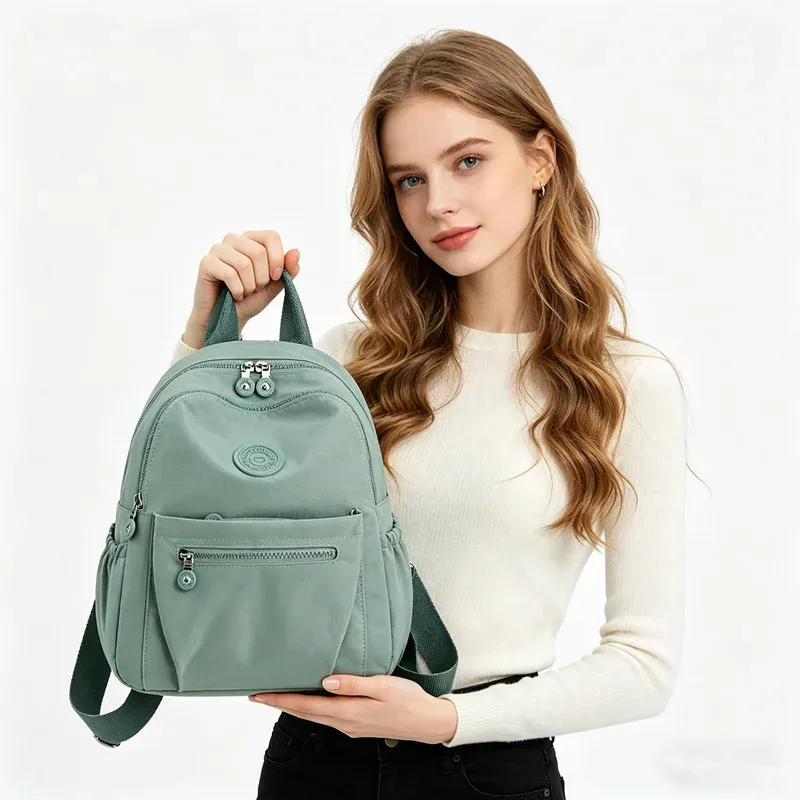 sac à dos léger en nylon pour femme, sac fourre-tout en nylon multi-poches, sac à dos décontracté imperméable pour les voyages, les trajets domicile-travail et l'usage quotidien