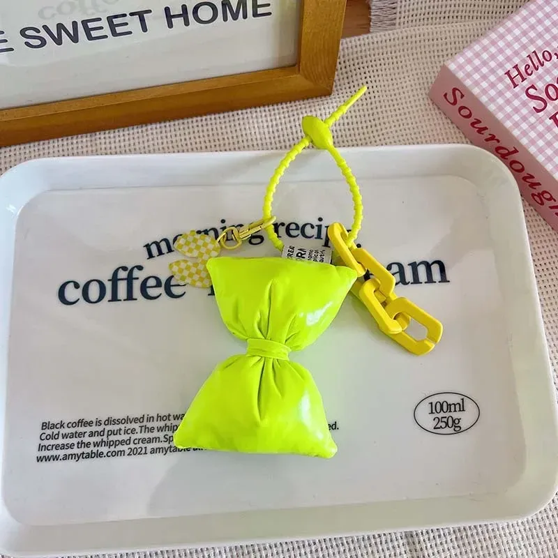 porte-clés en cuir et coton avec nœud doux pour fille, pendentif simple et mignon pour sac à dos, décoration de sacs