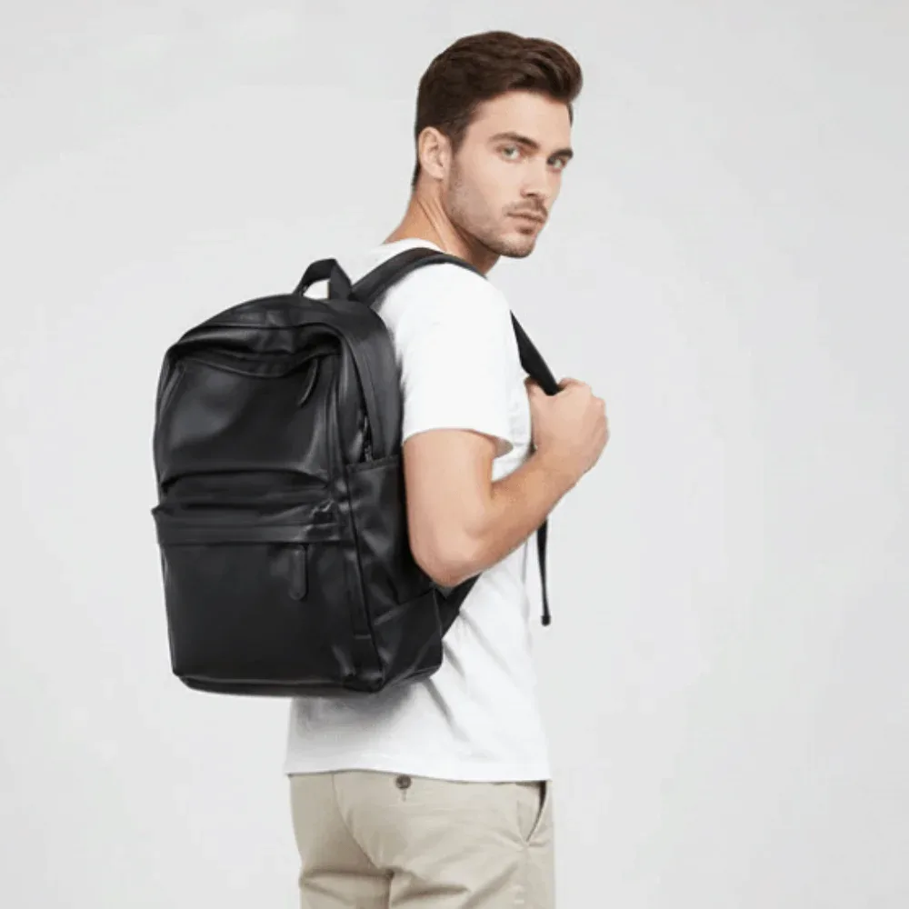 Sac à dos en cuir PVC pour homme, bretelles rembourrées, poche zippée cachée, compartiment pour ordinateur portable, double fente latérale