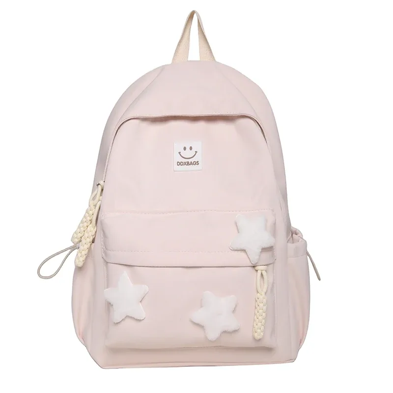sac à dos rose mignon pour filles cartable à la mode décoré d'étoiles avec porte-clés en peluche parfait pour une utilisation quotidienne et l'école style adorable et tendance idéal pour adolescente