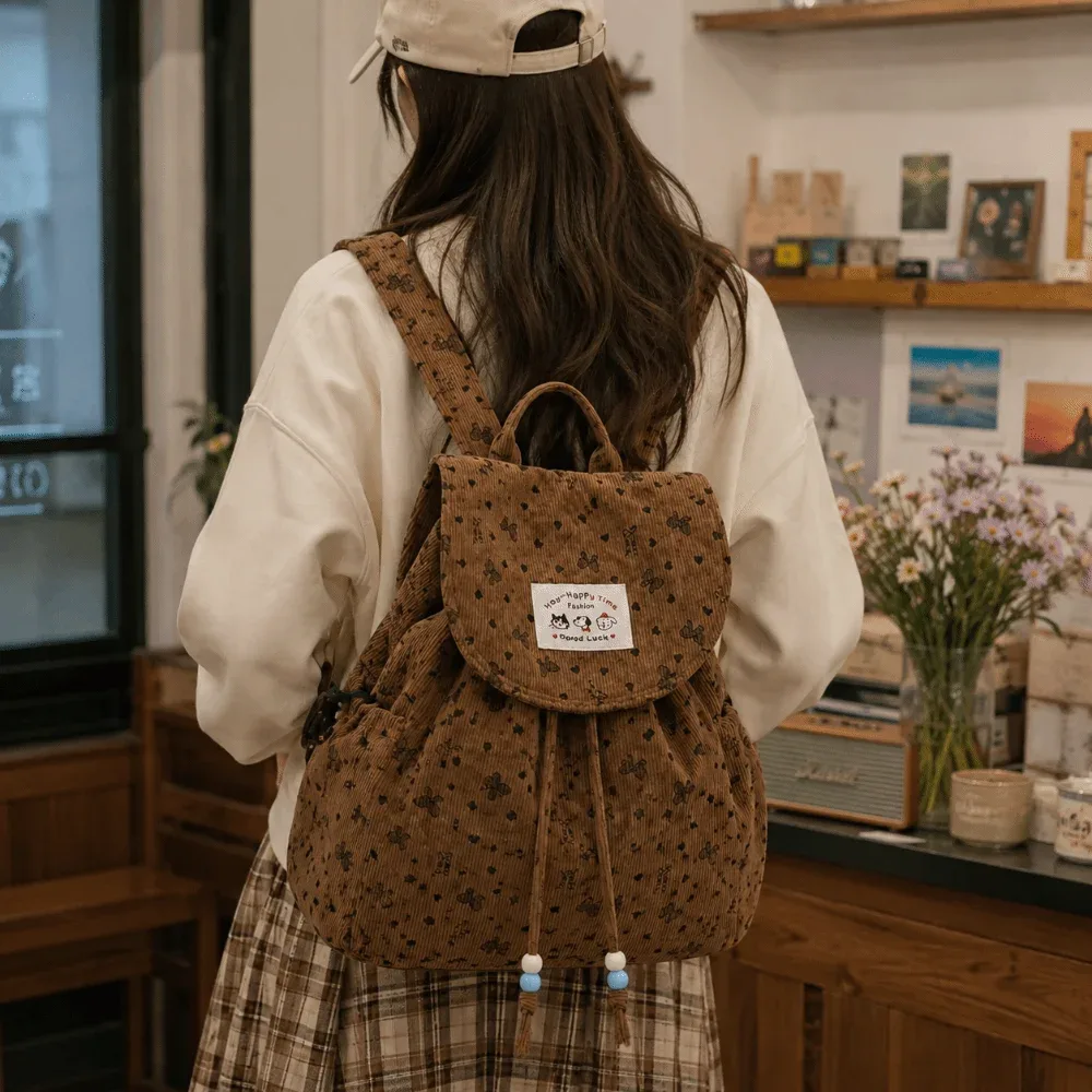 sac à dos en velours côtelé léger et mignon à imprimé nœud, grande capacité, décontracté, avec cordon de serrage, polyvalent, design simple, pour l'école