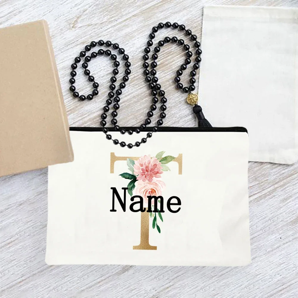 pochette en toile personnalisée avec initiales florales dorées, trousse de toilette légère personnalisée avec monogramme pour femmes, idéale pour les voyages quotidiens.