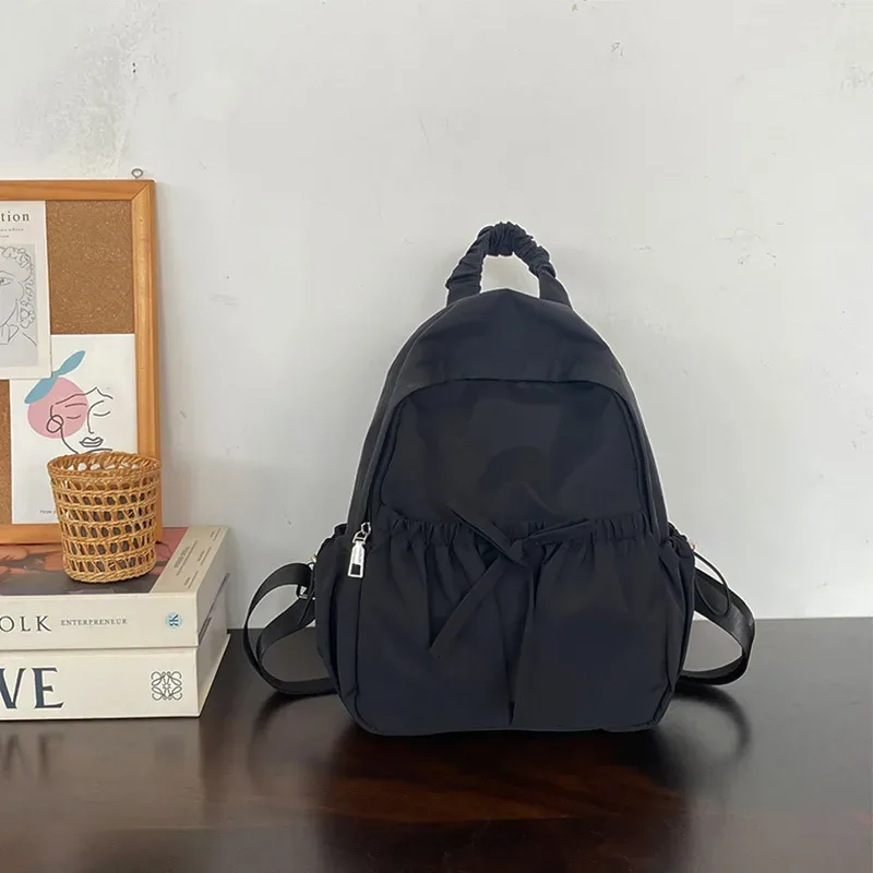 version coréenne design de niche nouveau sac à dos en nylon brodé, sac à dos léger polyvalent personnalisé de grande capacité