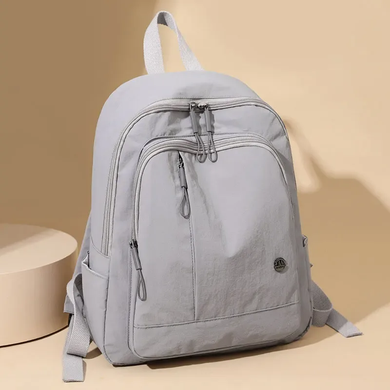 sac à dos décontracté pour femmes, léger et étanche, sac de voyage de grande capacité pour femmes, sac à dos d'école pour filles