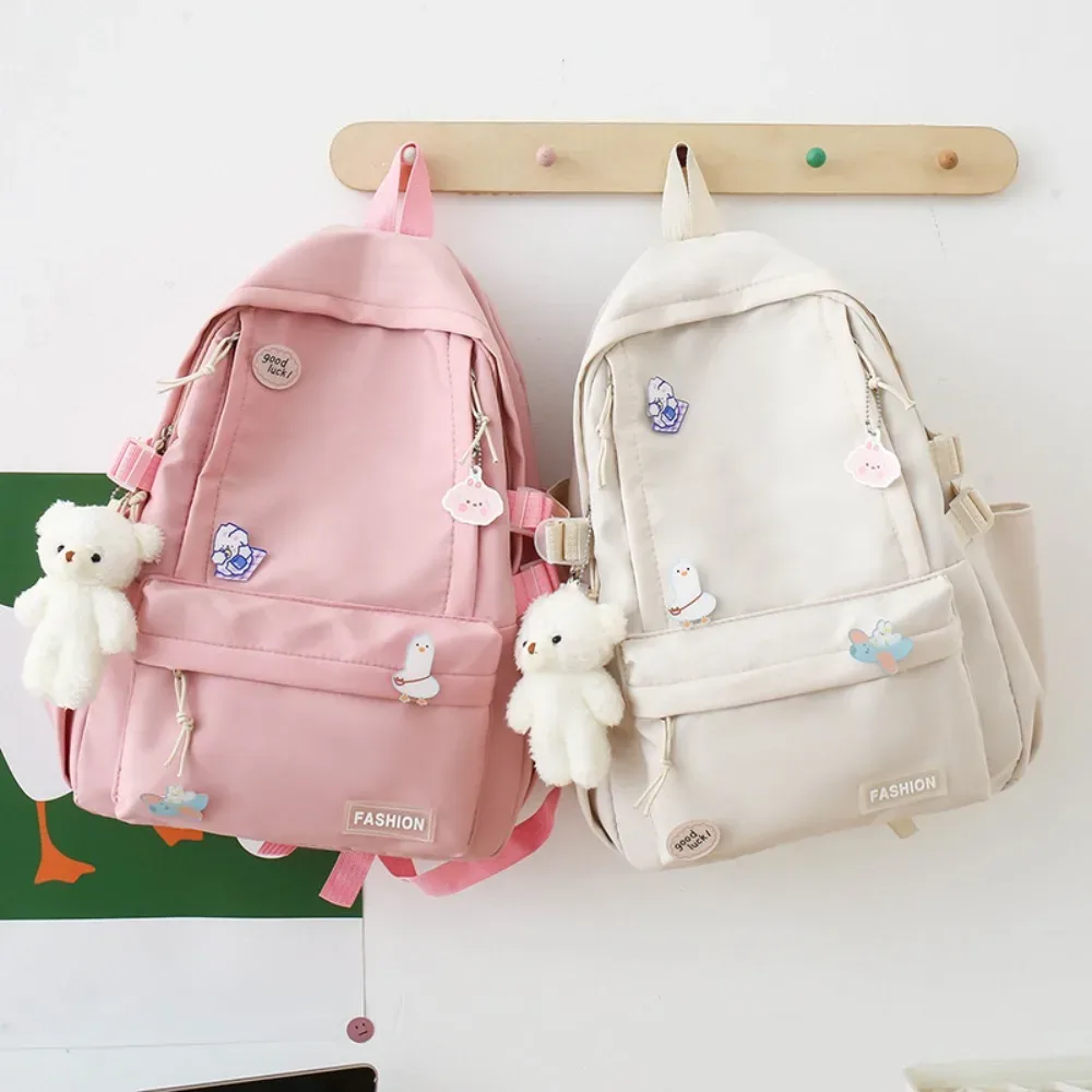 nouveau sac d'école de grande capacité portable couleur unie sac à dos léger sangle réglable sac de voyage en toile unisexe