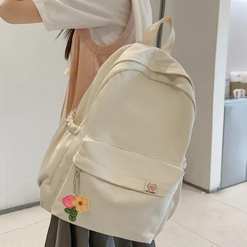 nouveau sac à dos imperméable en nylon pour femmes sac de voyage pour femmes sacs à dos cartable pour adolescentes couleur unie bookbag mochila bookbag