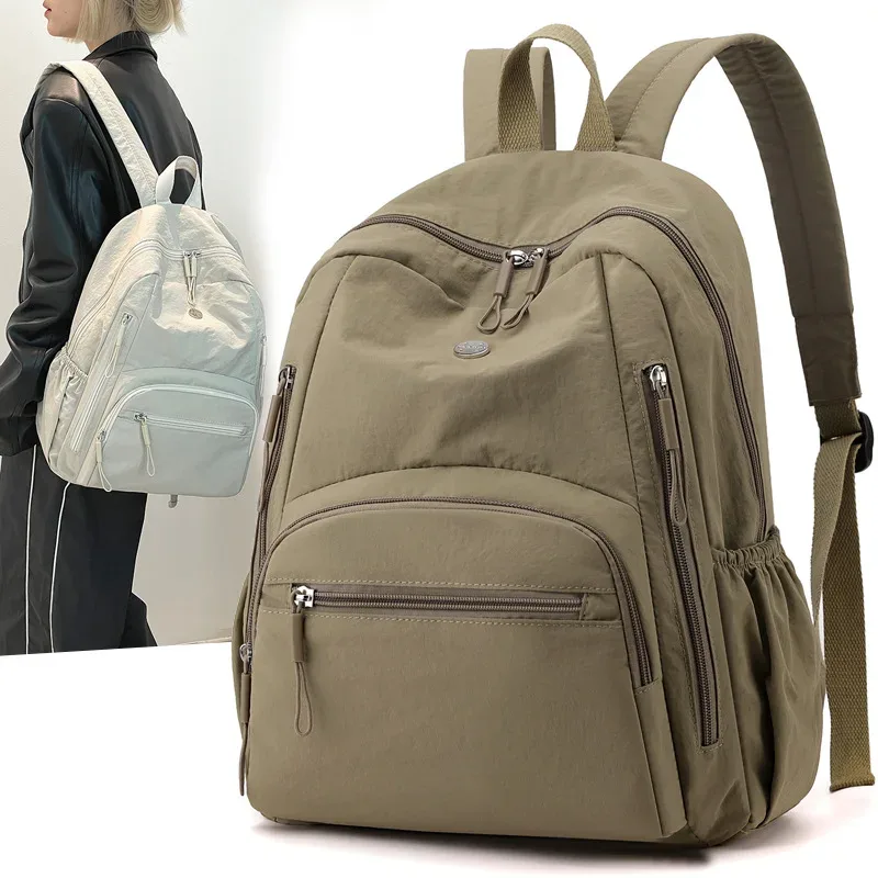 nouveau tissu en nylon imperméable léger grande capacité sac à dos à bandoulière série bouffante simple marée de déplacement dames sacs à bandoulière