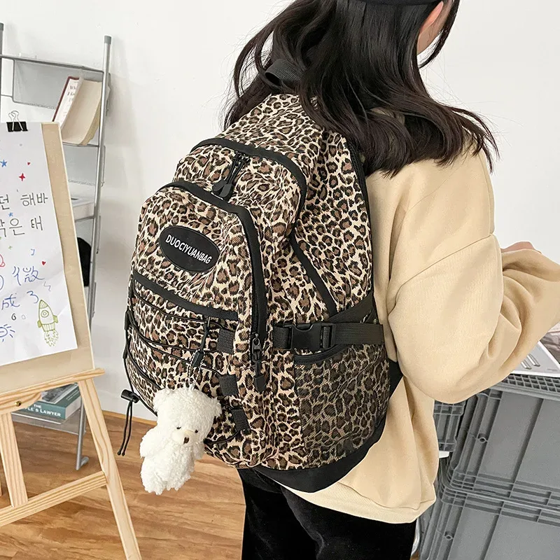 Sac à dos vintage à imprimé léopard, grande capacité, sac d'école avec poche latérale en maille, pour étudiants, voyages, streetwear