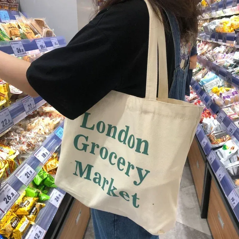 Sac pour femmes pas cher décontracté grande capacité sacs à bandoulière Shopper toile lettre mode Harajuku fermeture éclair impression Ulzzang sacs à main