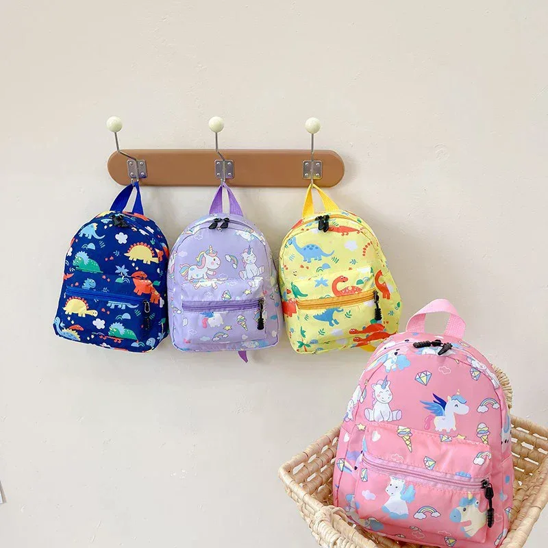 Sacs à dos dinosaures de dessin animé pour enfants, cartable mignon pour adolescents, sac d'école imperméable pour garçons et filles, sac animalier