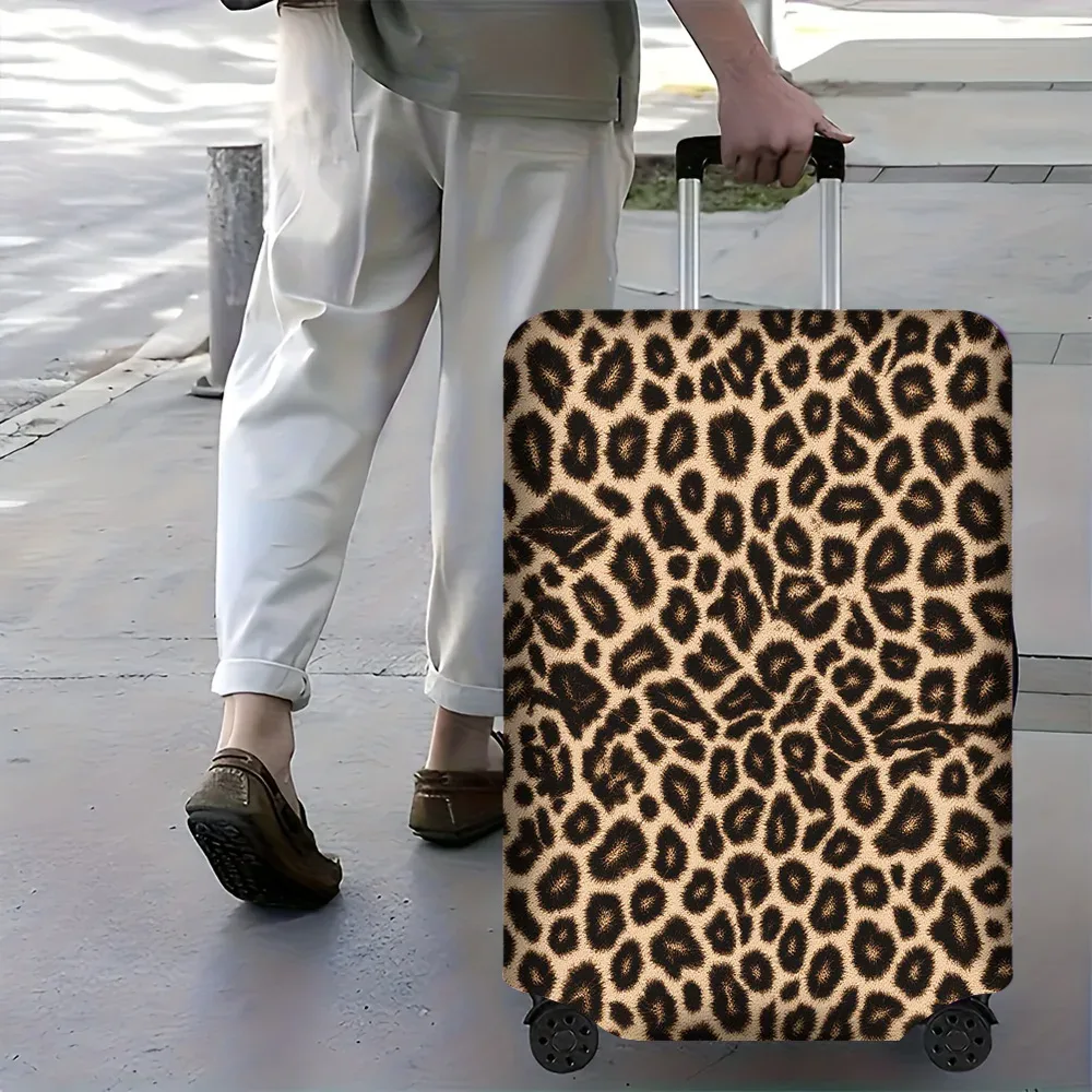 1 housse de bagage à imprimé léopard. s'adapte aux valises de 18 à 32 pouces ; protège efficacement vos bagages.